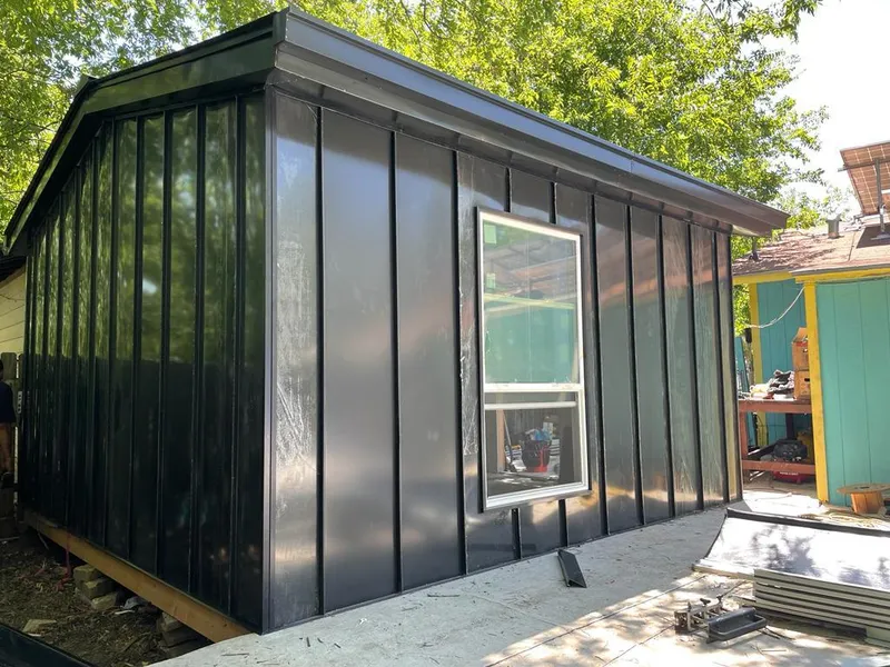 Black standing seam metal wall panels for Metal Roof Installation in Monticello